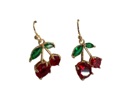 Cherry-themed earrings with red and green gemstones on a white background